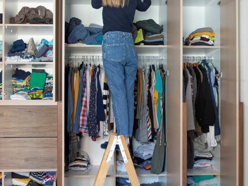 a lady arranging her storage room