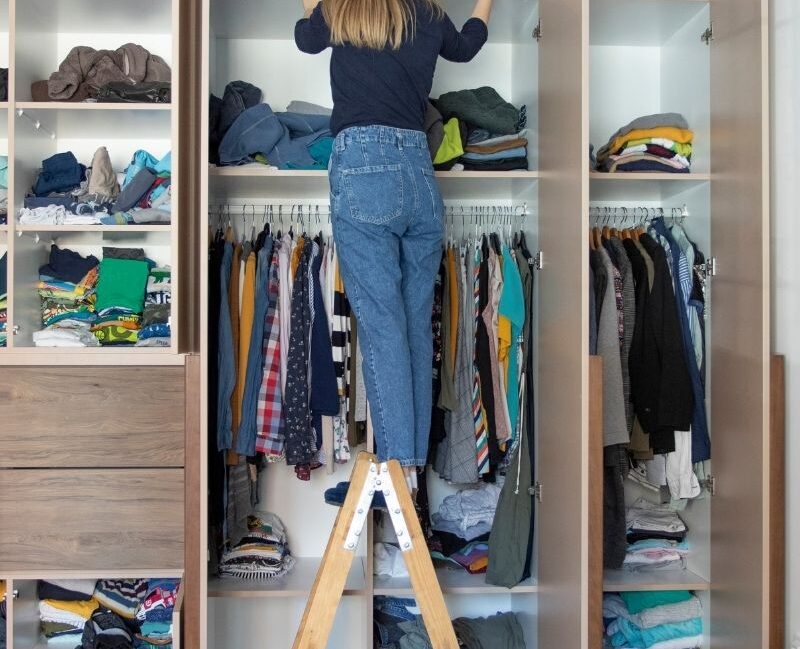 a lady arranging her storage room