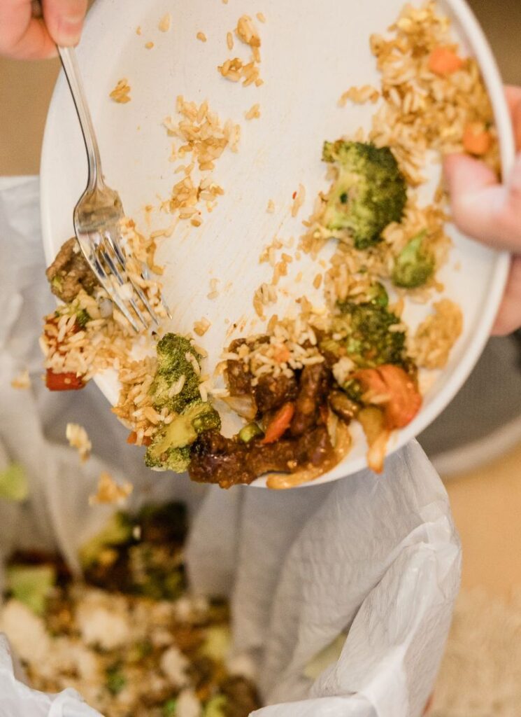 putting away leftover food