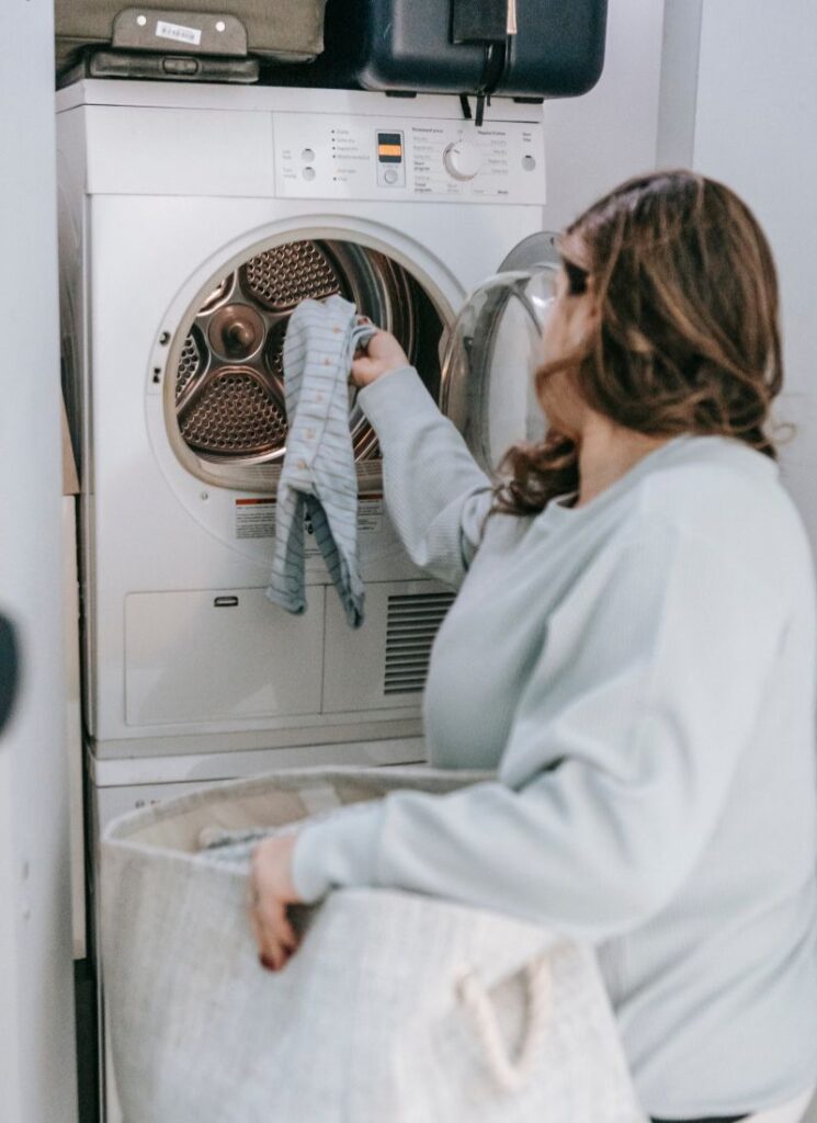 a lady doing her laundry